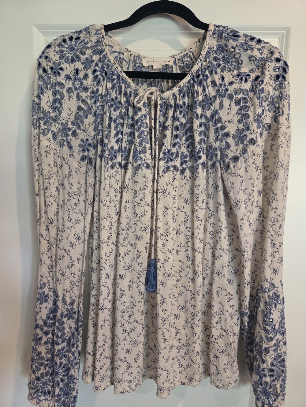 Lovestitch Cream Top with Blue Floral Embroidery and Tassel Tie